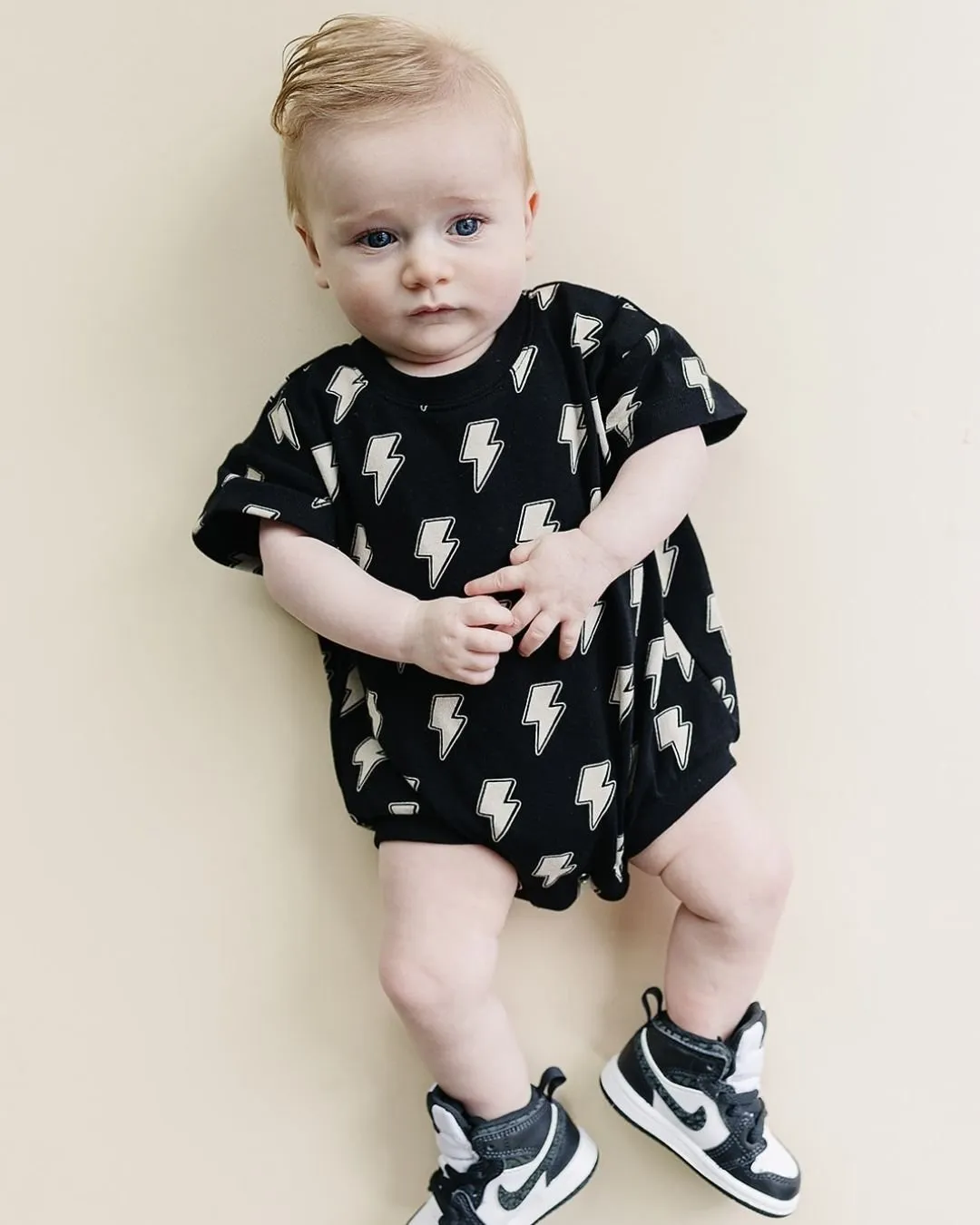 Bold Black Bolts on Short Sleeve Romper