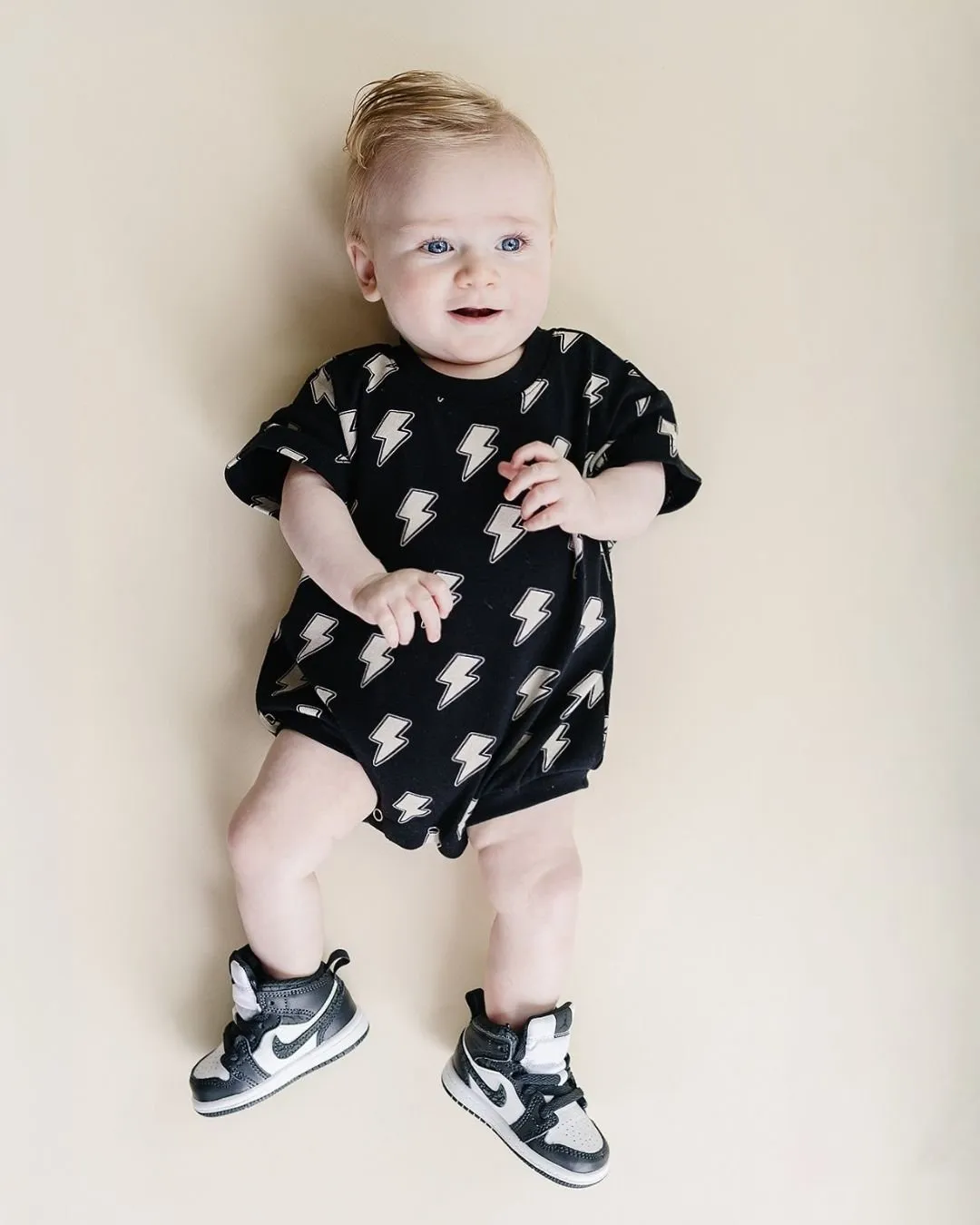 Bold Black Bolts on Short Sleeve Romper