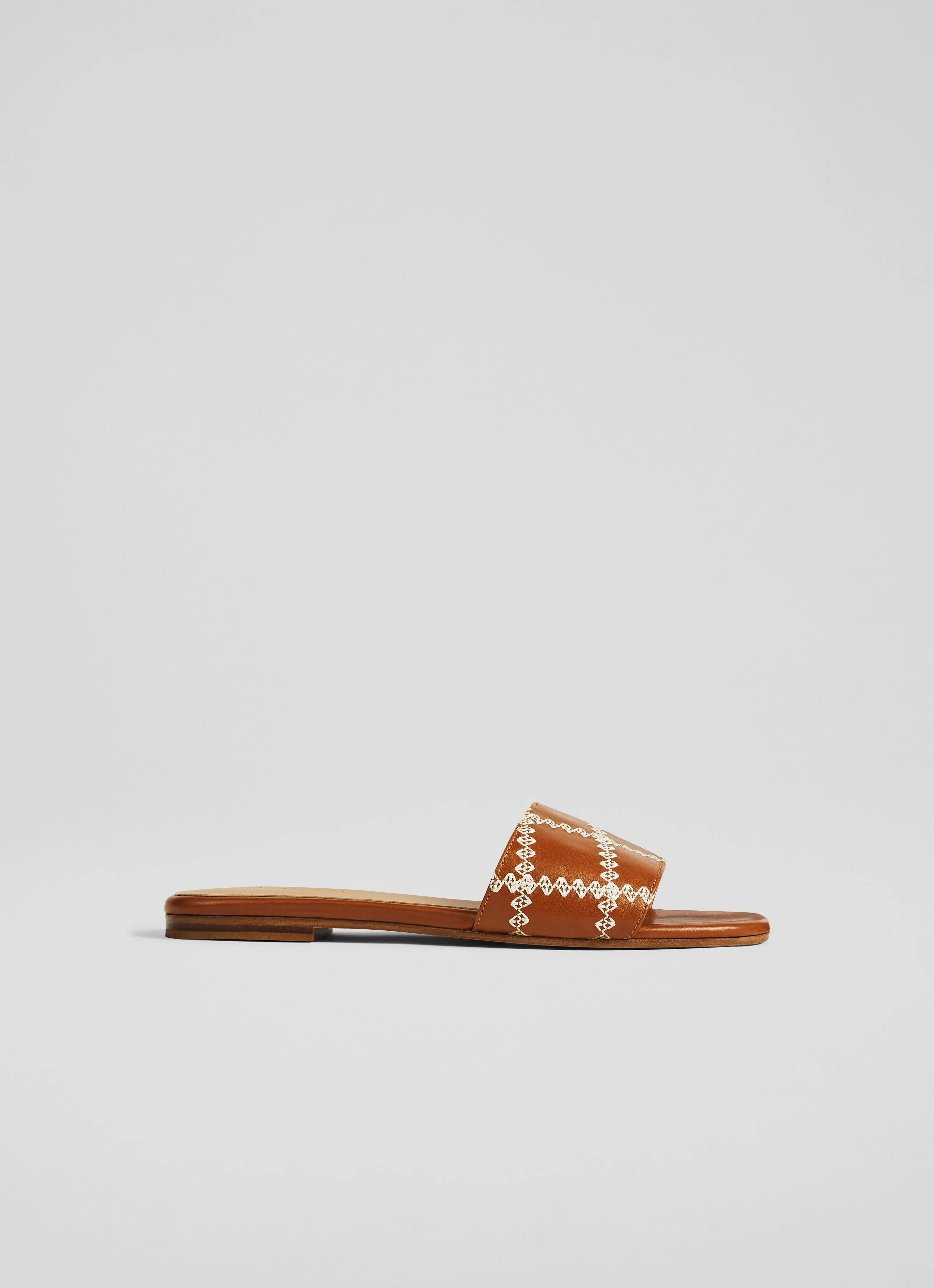 Hema Tan Leather Stitch Detail Flat Mules Saddle