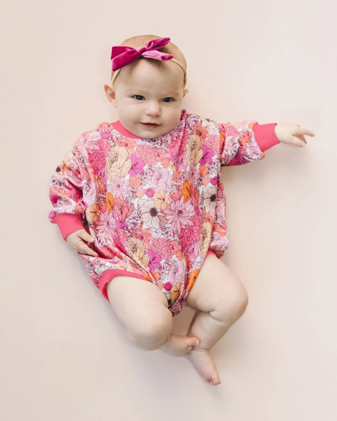 Pink Flowers Adorned Bubble Romper