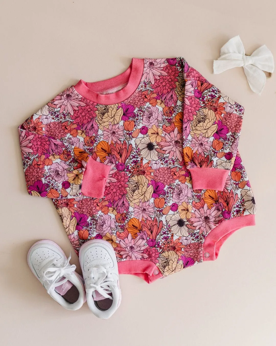 Pink Flowers Adorned Bubble Romper